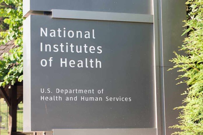 1168340341 featured image Sign for National Institutes of Health near trees