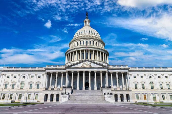 2091271387 featured image U.S. Capitol building with clear blue sky background.