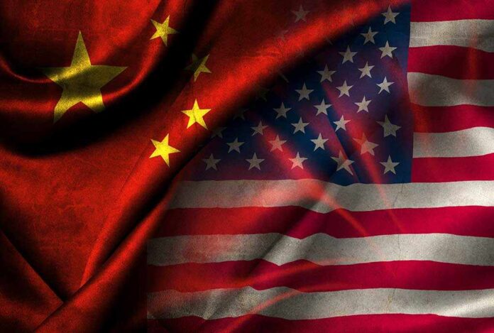 427969069 featured image Chinese and U.S. flags merged together.