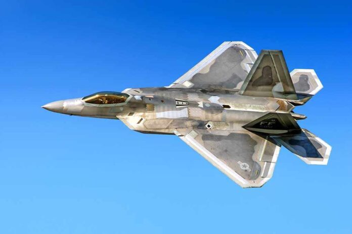 514318066 featured image Fighter jet in flight against a clear blue sky.