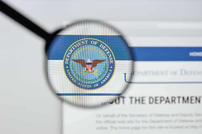 Magnifying glass over Department of Defense logo