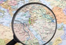 Magnifying glass over the Middle East and Egypt
