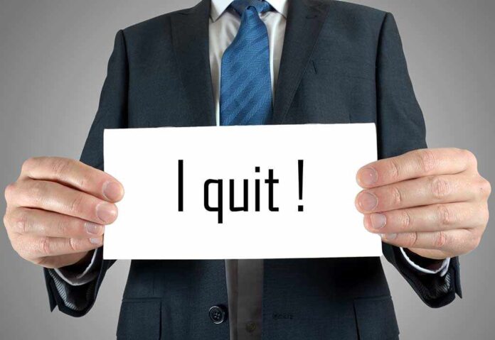 195128024 featured image Person holding a sign saying I quit!