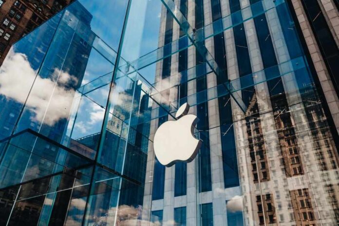 2374133657 featured image Apple store with glass facade and city reflections.