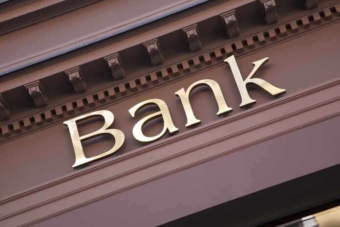 240120346 featured image Gold bank sign on building facade