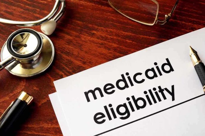 640488934 featured image Stethoscope pen document about Medicaid eligibility on table