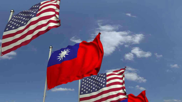 American and Taiwanese flags waving in the sky