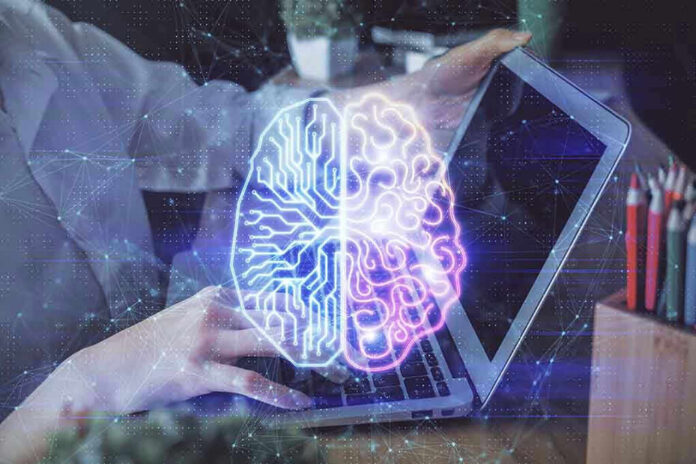 Futuristic AI brain hologram above a laptop computer