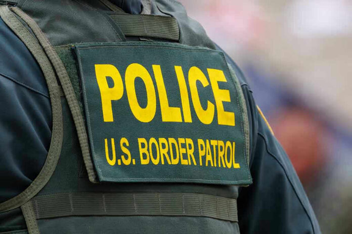 Police U.S. Border Patrol uniform close-up.