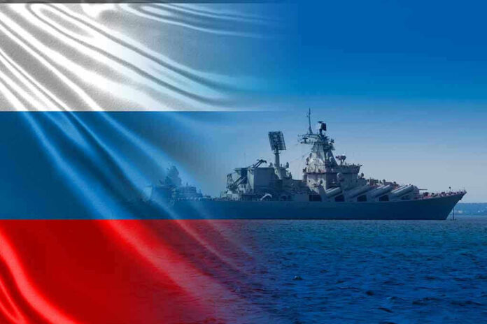 1733318756 Warship overlaid with the Russian flag.