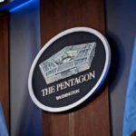 Pentagon Walkout – Badges TURNED IN! The Pentagon emblem between two flags.