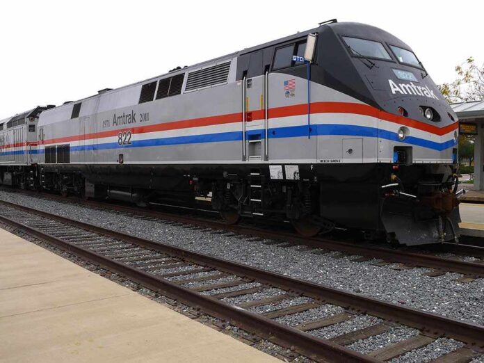 Amtrak locomotive parked at a railway station