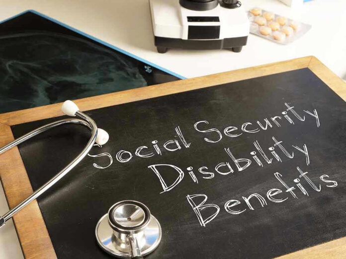 2036779991 Stethoscope and chalkboard saying Social Security Disability Benefits.