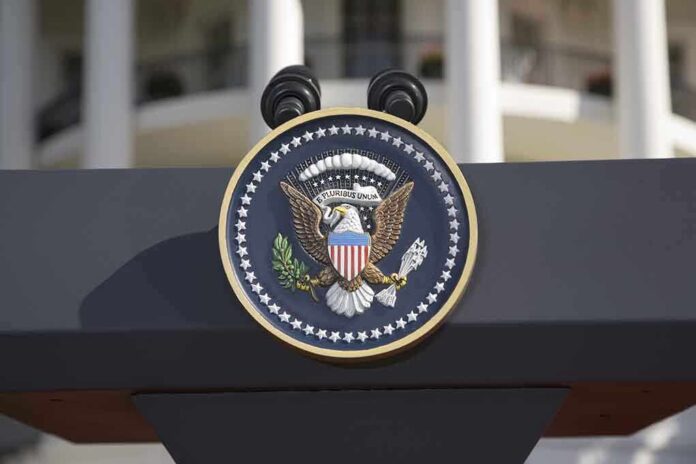Close-up of the presidential seal on a podium