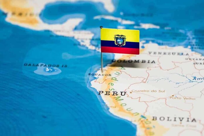 shutterstock_1326827759 (1).jpg Map of South America with a flag of Ecuador placed on Peru