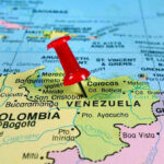 Vance MISSING During Maduro Raid Sparking Whispers Red pin on Venezuela, South America map.