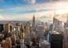 Aerial view of New York City skyline featuring the Empire State Building at sunset