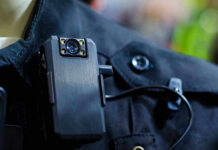 Body camera attached to a black uniform.