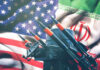 Iran TARGETS U.S. Bases — Thousands in Crosshairs Missiles in front of American and Iranian flags.
