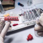 FBI RAIDS Hidden US Biolab — Terrifying Discovery Inside Gloved hands holding evidence swab in laboratory.