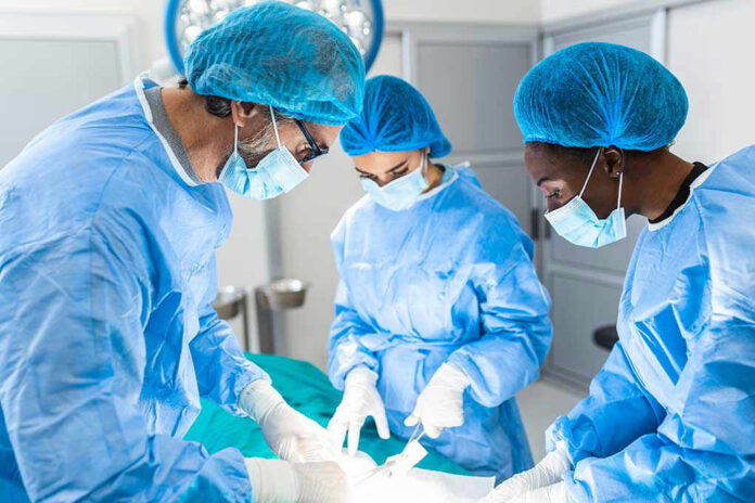 Surgeons performing an operation in a sterile environment.