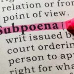 Highlighted definition of subpoena in a dictionary