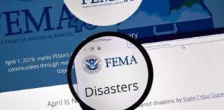 FEMA website with a focus on disaster information under a magnifying glass