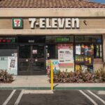 7-Eleven in the CROSSHAIRS Exterior view of a 7-Eleven convenience store with an ATM