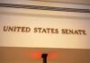 Sign displaying United States Senate in a government building