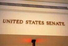 Sign displaying United States Senate in a government building