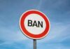 A road sign displaying the word 'BAN' against a blue sky