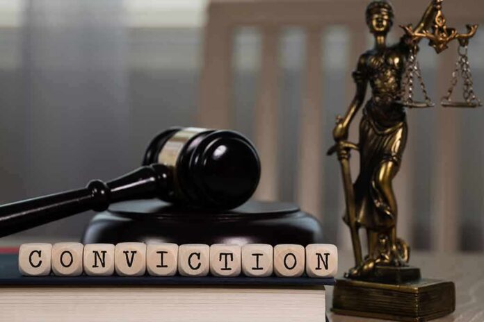 A gavel and the word 'CONVICTION' spelled with wooden blocks