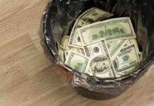 NYC Comptroller EXPOSES SHOCKING Catastrophe A trash can filled with crumpled hundred dollar bills