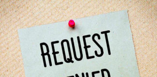 Note with request denied message pinned up