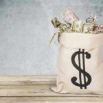Lithium Jackpot FOUND–Worth BILLIONS! Bag of money with dollar sign.