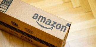 Amazon package on wooden floor.