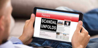 Person reading tablet with headline Scandal Unfolds.