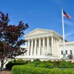 Supreme Court SHOCK Move–Hands GOP Major WIN Supreme Court building with American flag and surrounding greenery