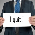 Governor’s Campaign CRUMBLES 40 Days Out A man in a suit holding a sign that says I quit