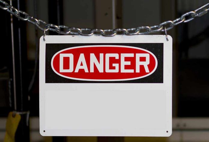 shutterstock_99493028.jpg A warning sign displaying the word DANGER in bold red letters