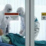 DEADLY Meningitis Cluster Hidden — WHY? Healthcare workers in protective gear in quarantine room.