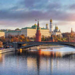 SHOCKING Absence — NO TANKS at conic Parade Kremlin by river at sunset with bridge.