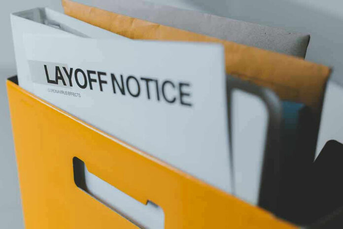 172298839 Layoff notice in a yellow box.