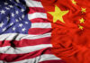 United States flag merged with China flag.