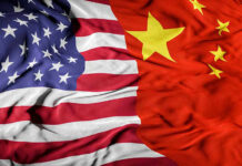 United States flag merged with China flag.