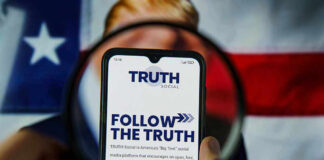 Phone screen displaying Truth Social app magnified