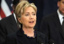 Anonymous Health Claim Sparks Online Firestorm Without Evidence A female politician speaking at a podium during a public address