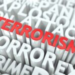 Teacher Beheaded on Camera – WHO Did It? The word 'TERRORISM' prominently displayed in red among other related terms