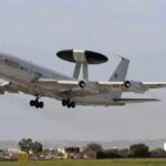 Russian Oil Terminals CRIPPLED — U.S. on Edge NATO AWACS aircraft taking off from an airfield