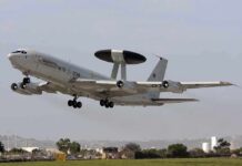Russian Oil Terminals CRIPPLED — U.S. on Edge NATO AWACS aircraft taking off from an airfield